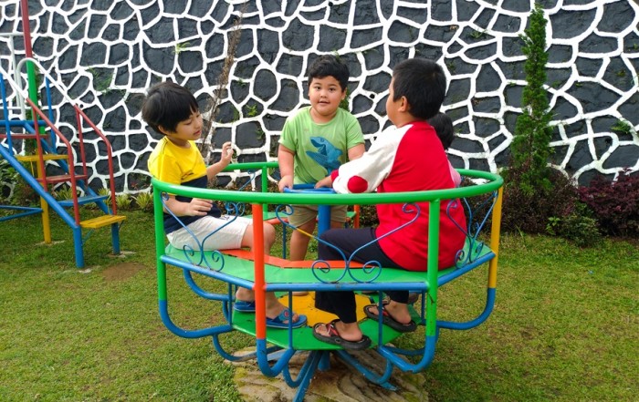Kids playing togetther at playground